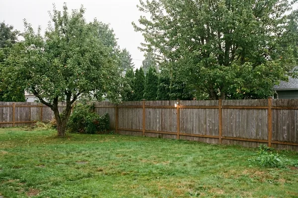Empty backyard before a detached cottage build